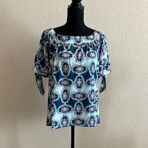 Tracy Negoshian off shoulder top